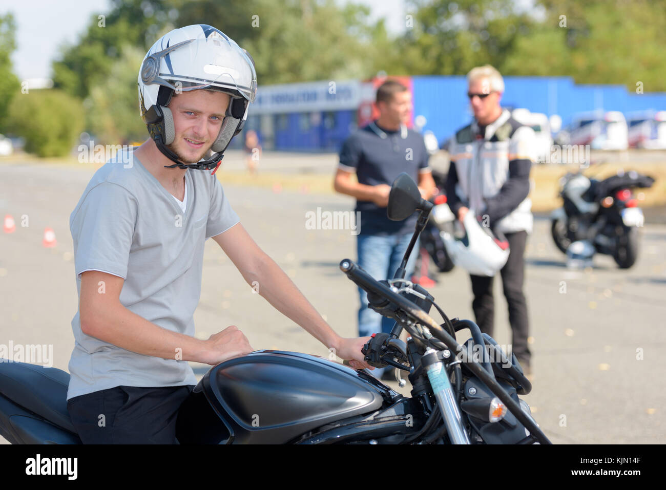 motorcycle practice leaning into a fast corner on track Stock Photo Alamy