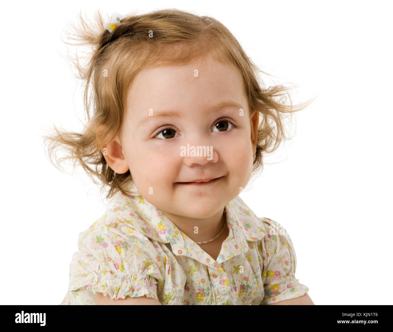 Happy little girl smiling looking up isolated Stock Photo - Alamy