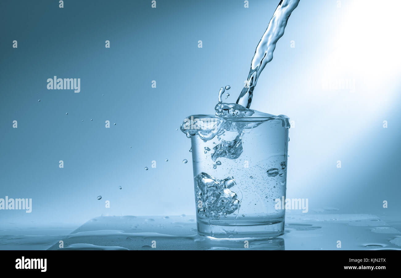 Pouring glass fresh mineral water hi-res stock photography and images ...