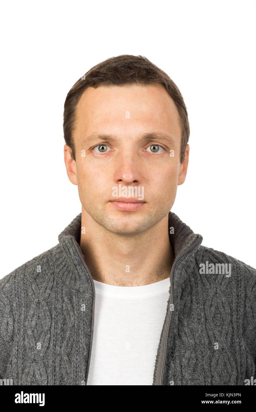 Closeup studio face portrait of young European man isolated on white background Stock Photo