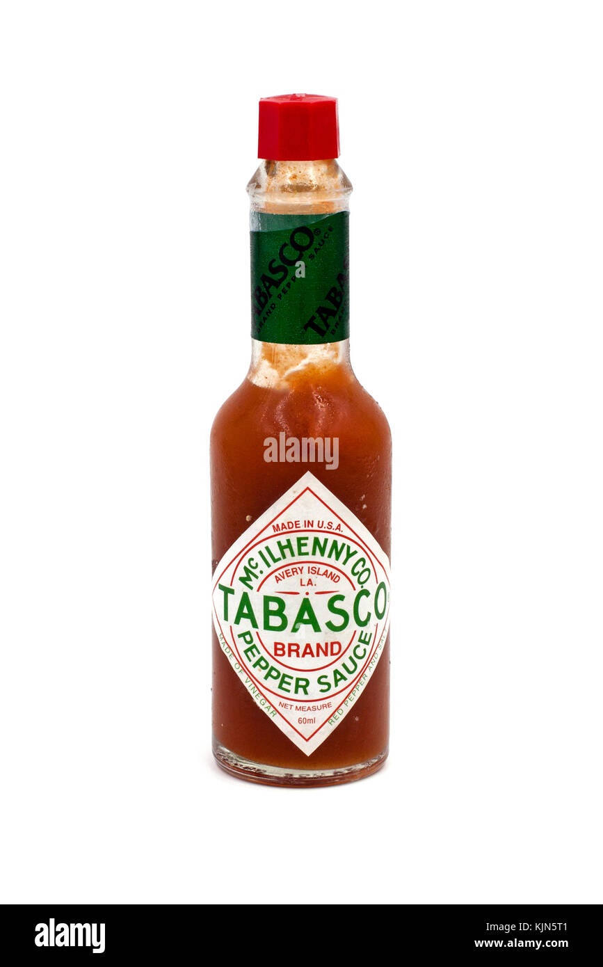 Bottle of Tabasco hot pepper sauce isolated on white background Stock Photo