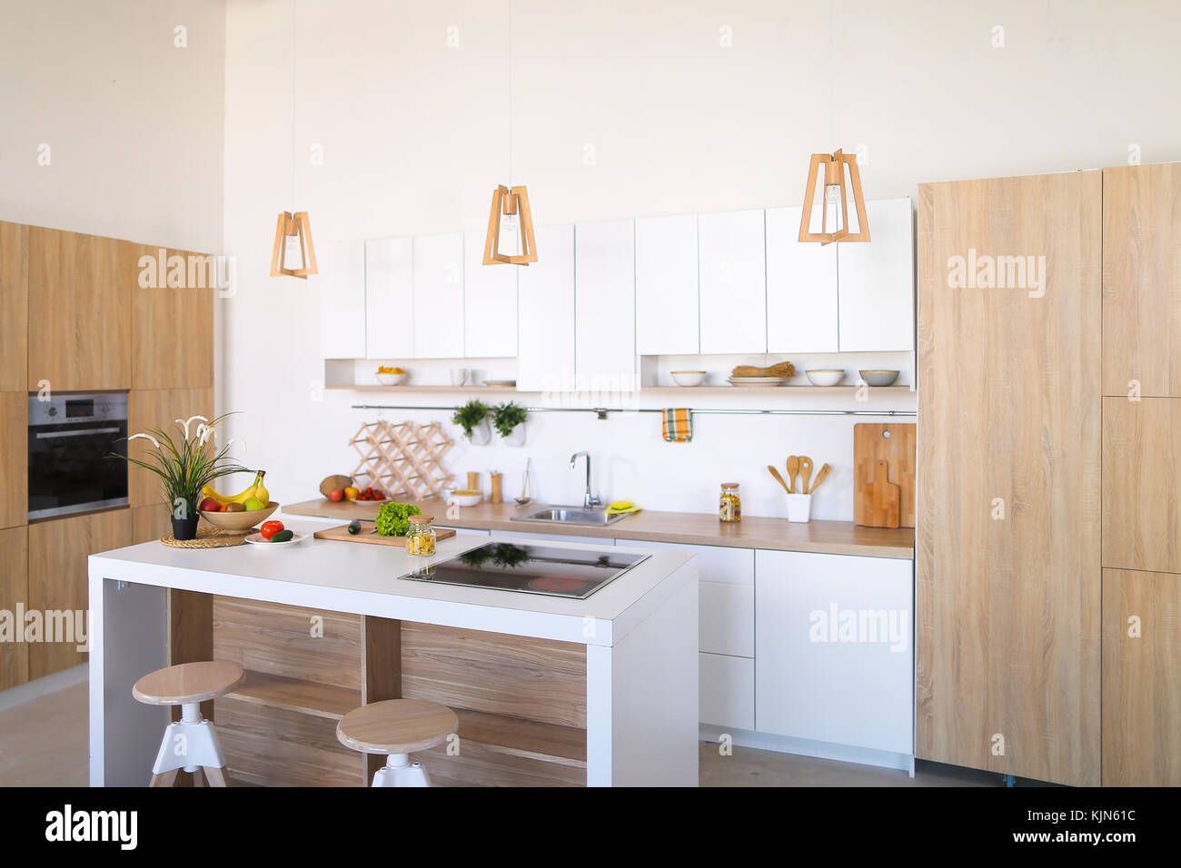 Interior of modern light kitchen with variety of appliances and Stock ...