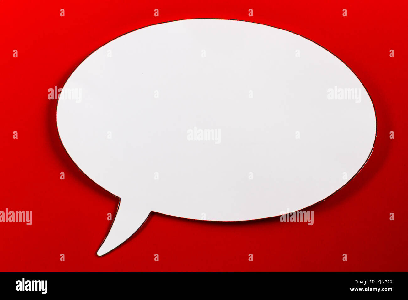 Blank speech bubble on red background Stock Photo - Alamy