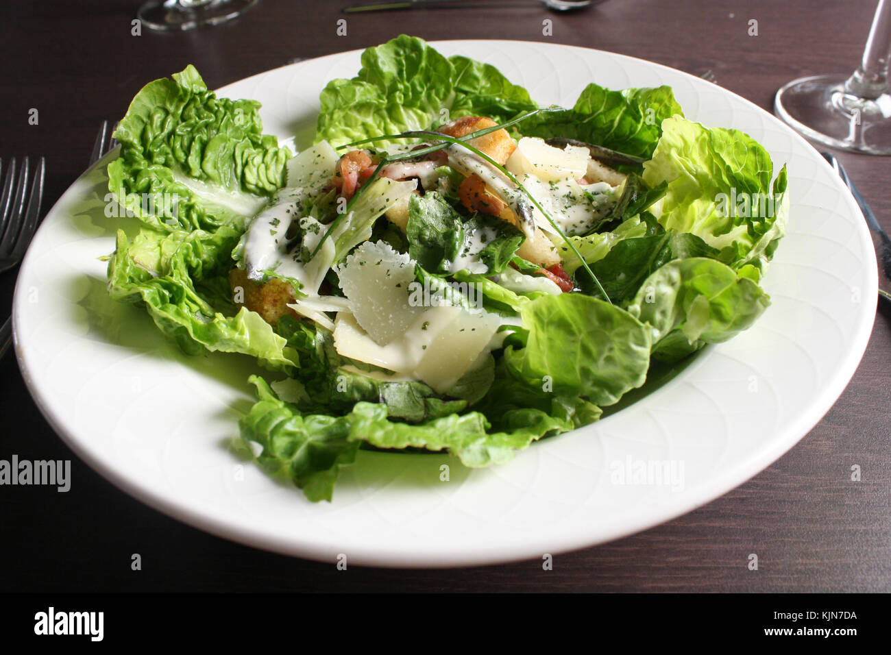 close up of caesar salad bowl in restaurant Stock Photo Alamy