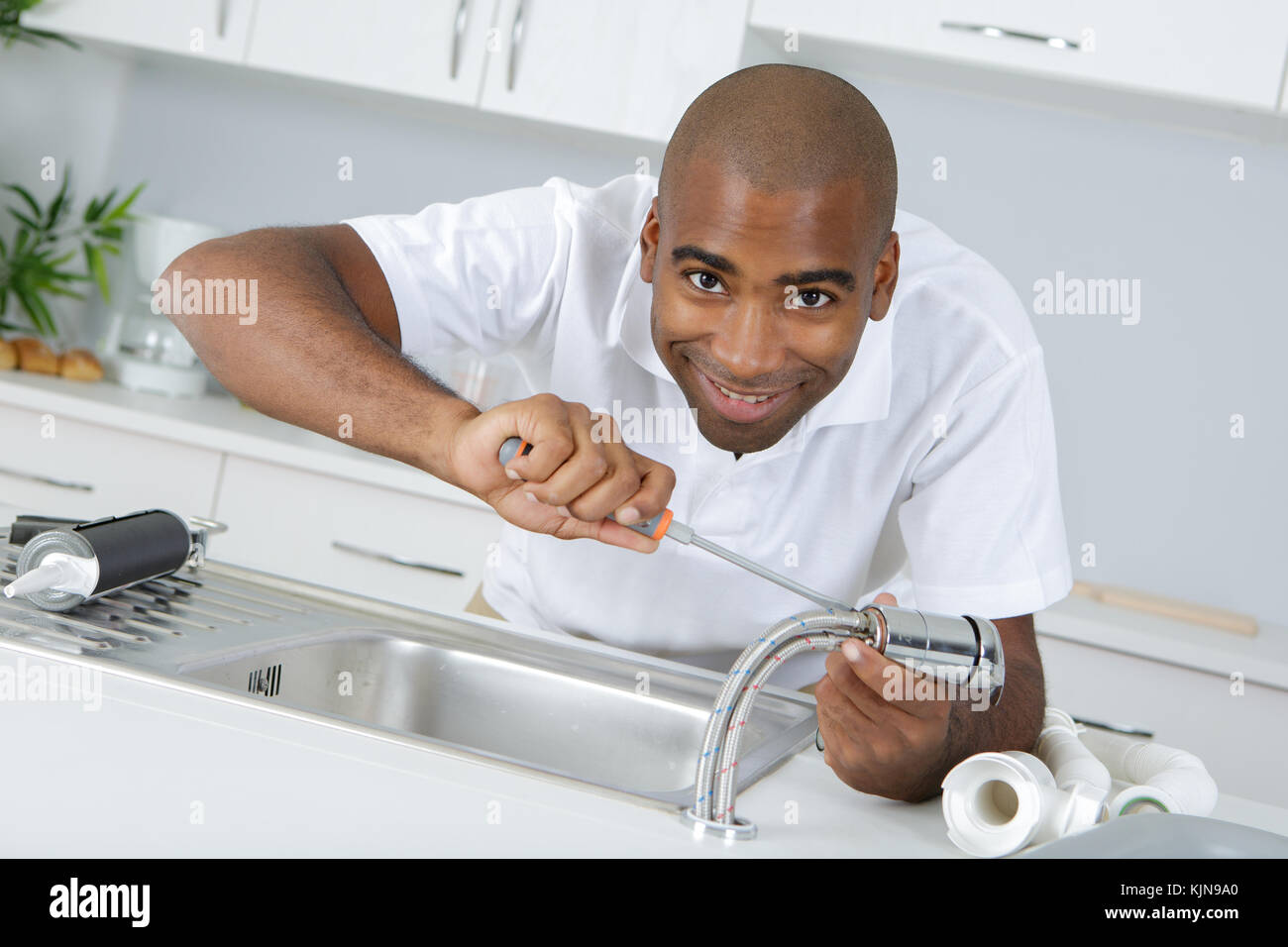 replacement of sink tube Stock Photo Alamy