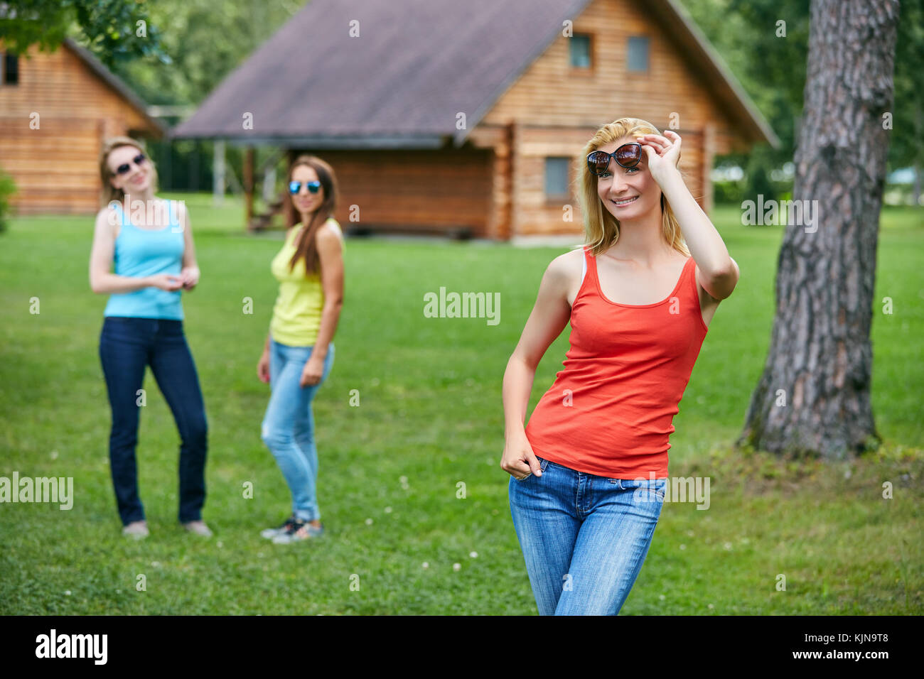 three girls having fun outdoors Stock Photo - Alamy