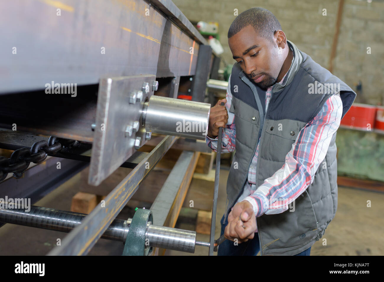 adjusting the machinery Stock Photo