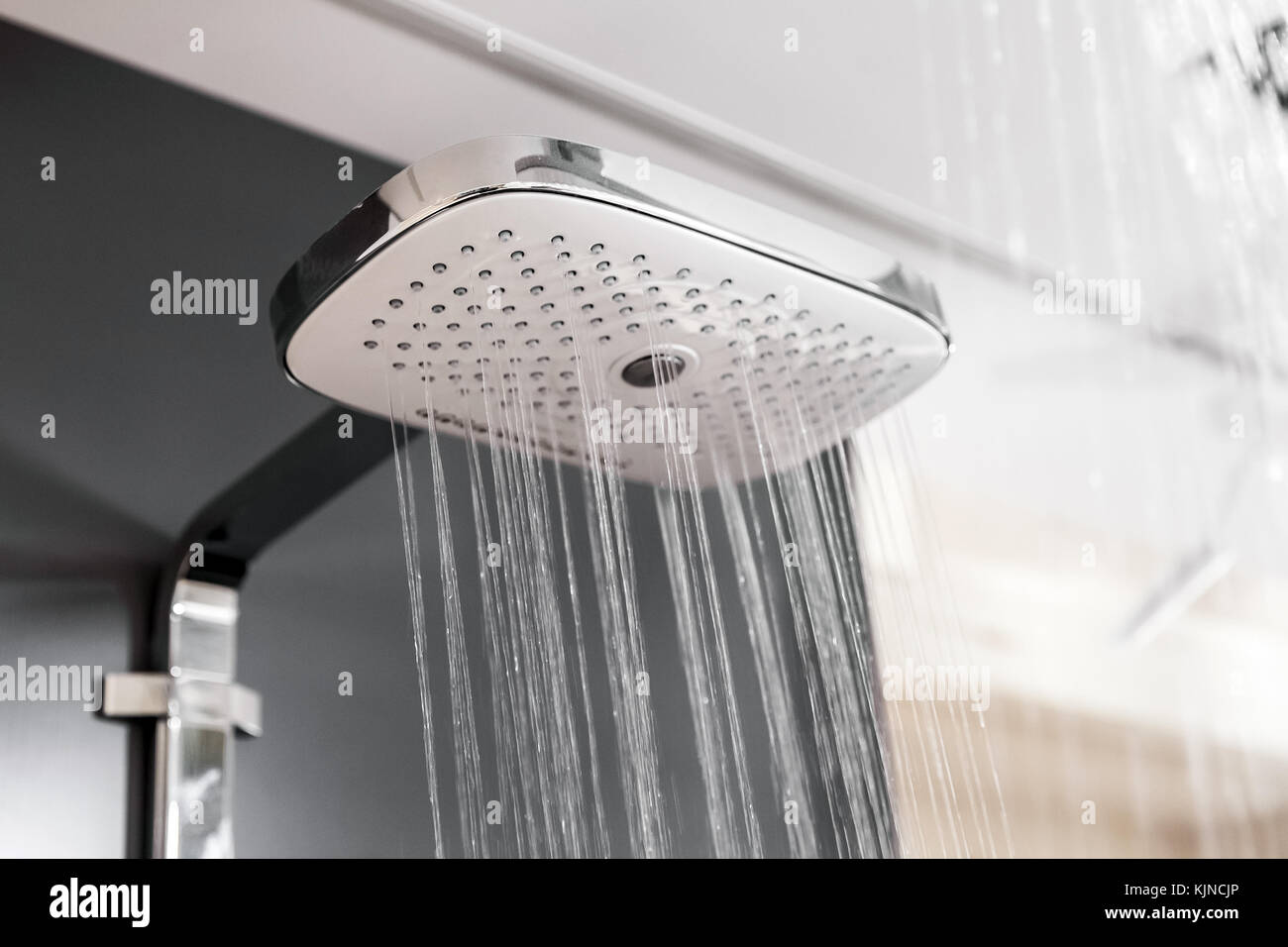 Modern shower with water drops in bath interior Stock Photo - Alamy