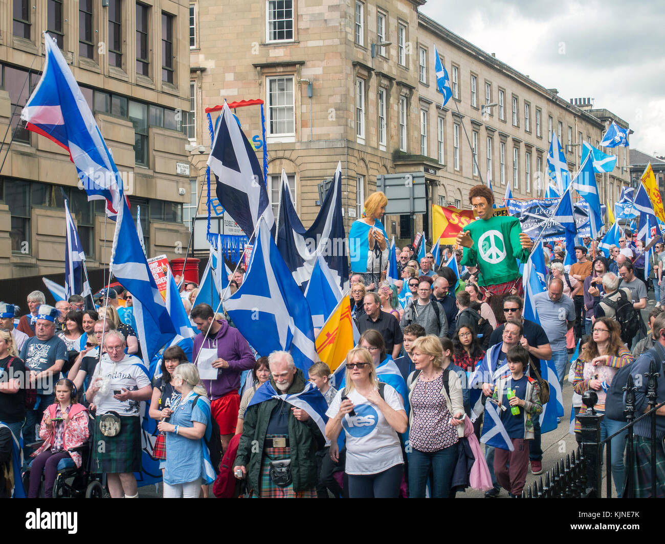 GLASGOW, SCOTLAND- JUNE 03 2017: A crowd of people march towards George