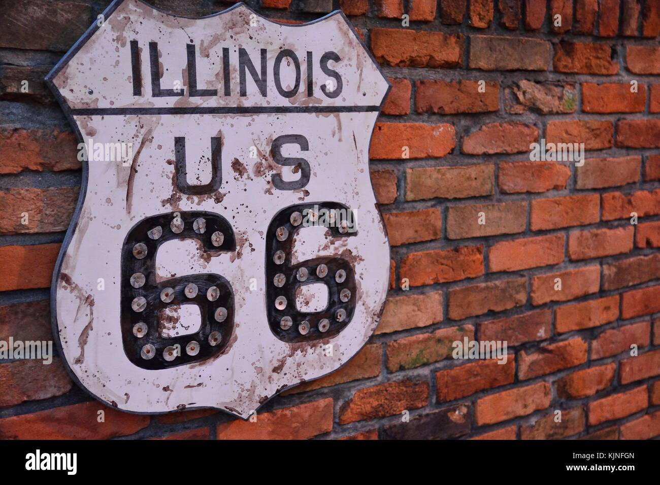 Historic Route 66 road sign painted on a brick wall in Illinois Stock ...