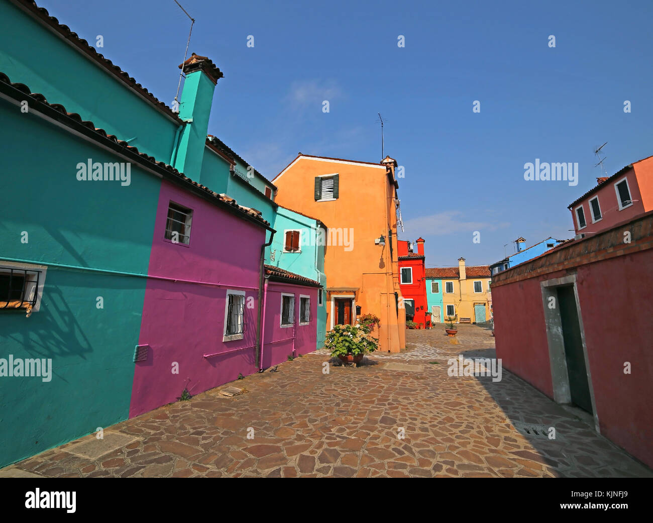 Burano in Italy is an island near Venice famous for its colorful houses ...
