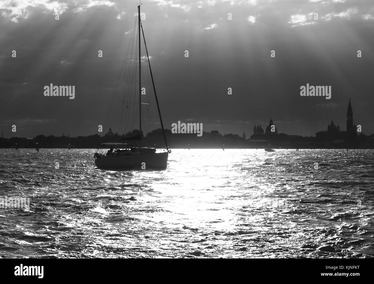 Sailing boat in the sea with backlit and Black and White photographic ...