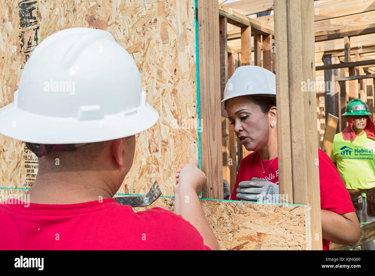 Houston, Texas Volunteers from Wells Fargo Bank help build a Habitat for Humanity house for a