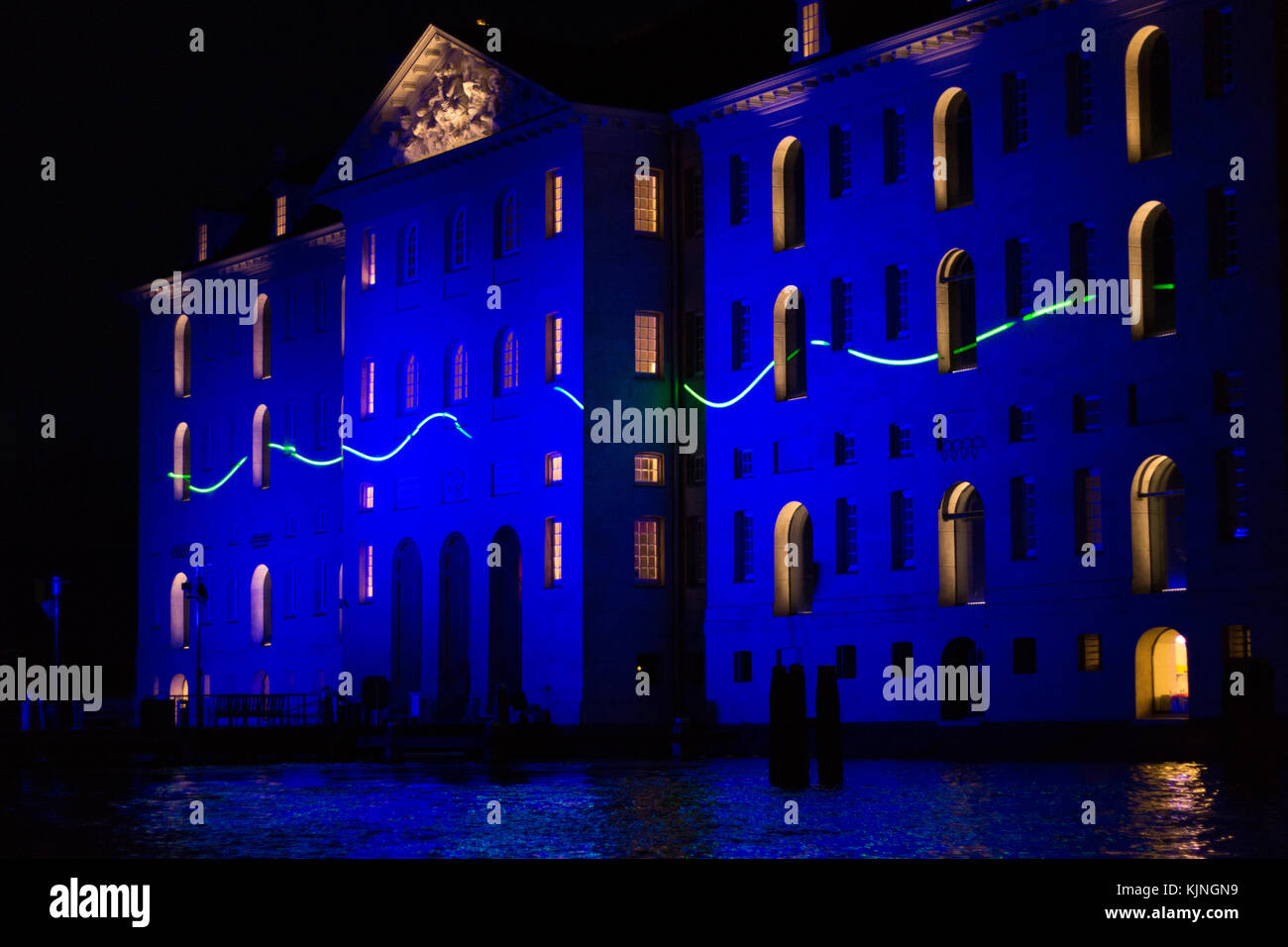 Amsterdam, Netherlands – January 14, 2017: Illuminated Het Scheepvaartmuseum by night at Amsterdam Light Festival Stock Photo