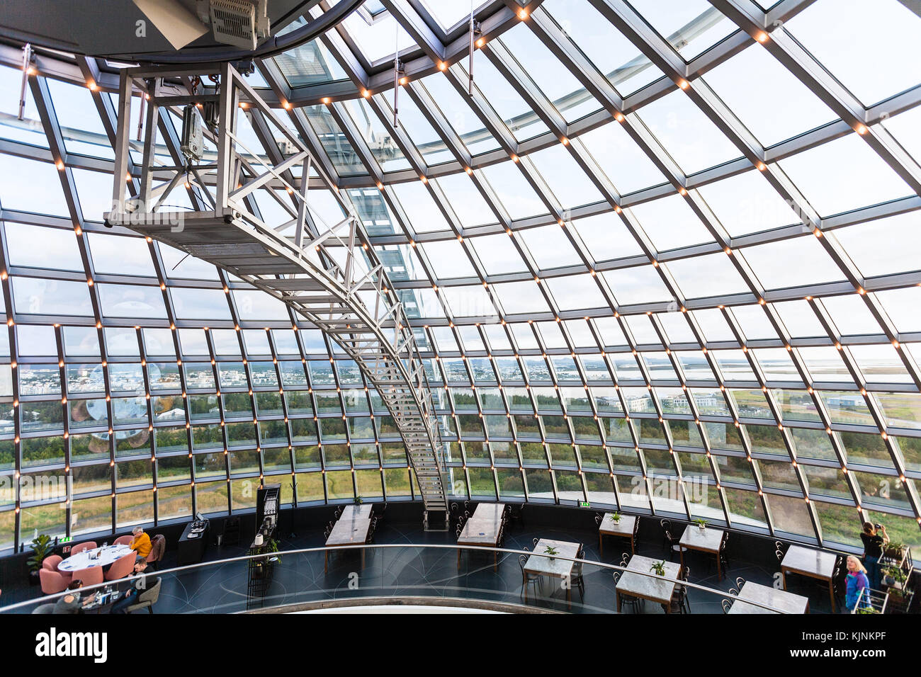 REYKJAVIC, ICELAND - SEPTEMBER 7, 2017: visitors inside glass dome on Observation Deck of Perlan Museum in Reykjavik city in evening. The Perlan Museu Stock Photo
