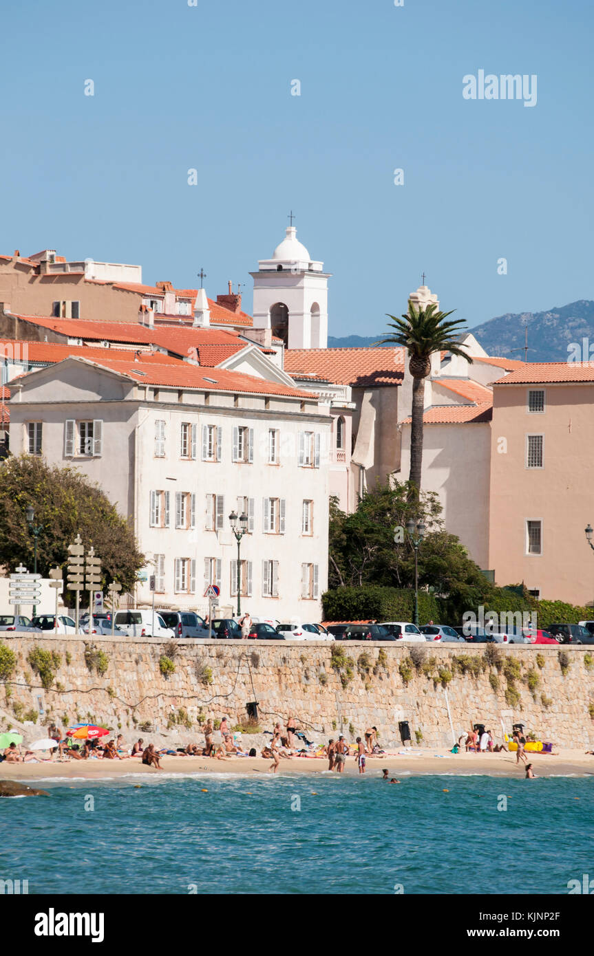 Corsica: skyline of Ajaccio, famous city on the west coast of the southern Corsica, and waterfront with view on the Mediterranean Sea and urban beach Stock Photo