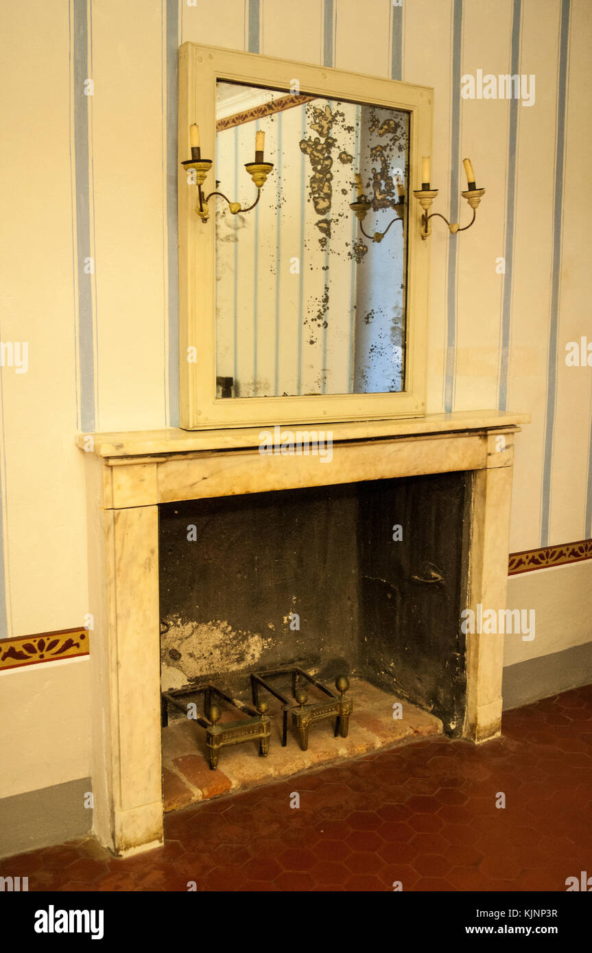 Corsica: a fireplace in a living room at the Maison Bonaparte in Ajaccio, the ancestral home of the Bonaparte family and the birthplace of Napoleon Stock Photo