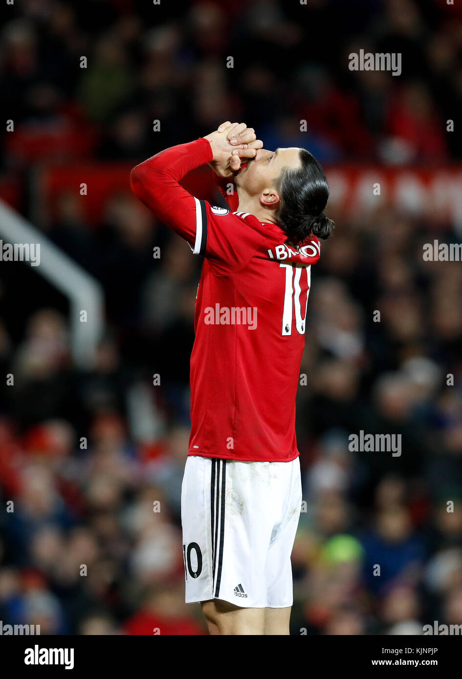 Manchester United's Zlatan Ibrahimovic genuflects during the Premier League match at Old Trafford, Manchester. Stock Photo