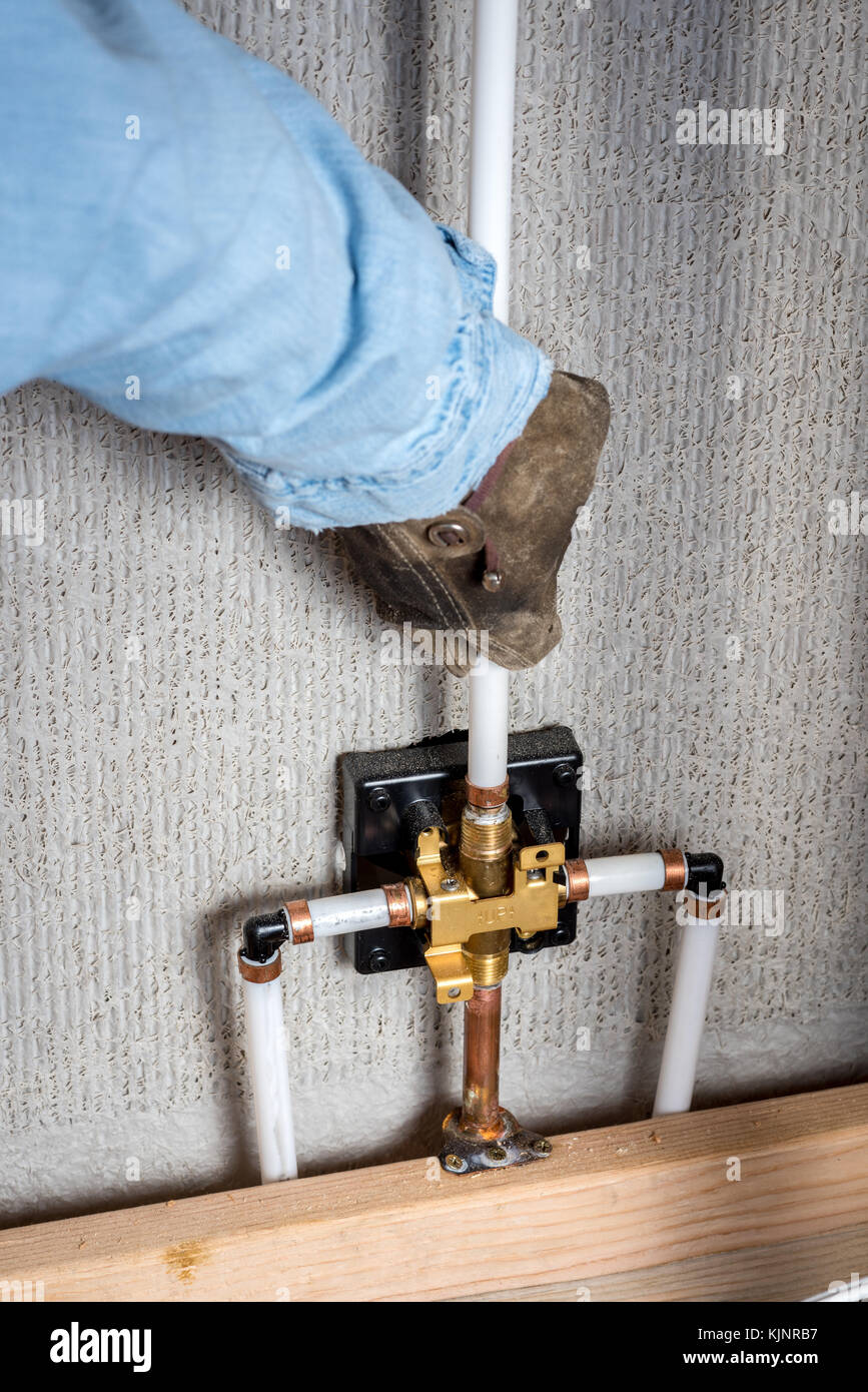 Plastic pipe put into place by a plumber Stock Photo Alamy