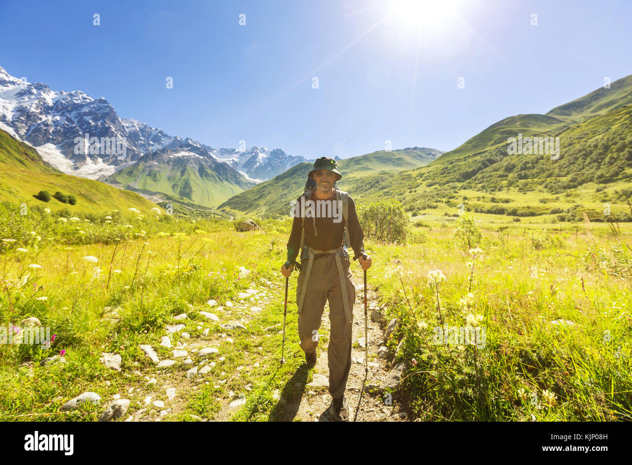 Hiking in mountains Stock Photo - Alamy