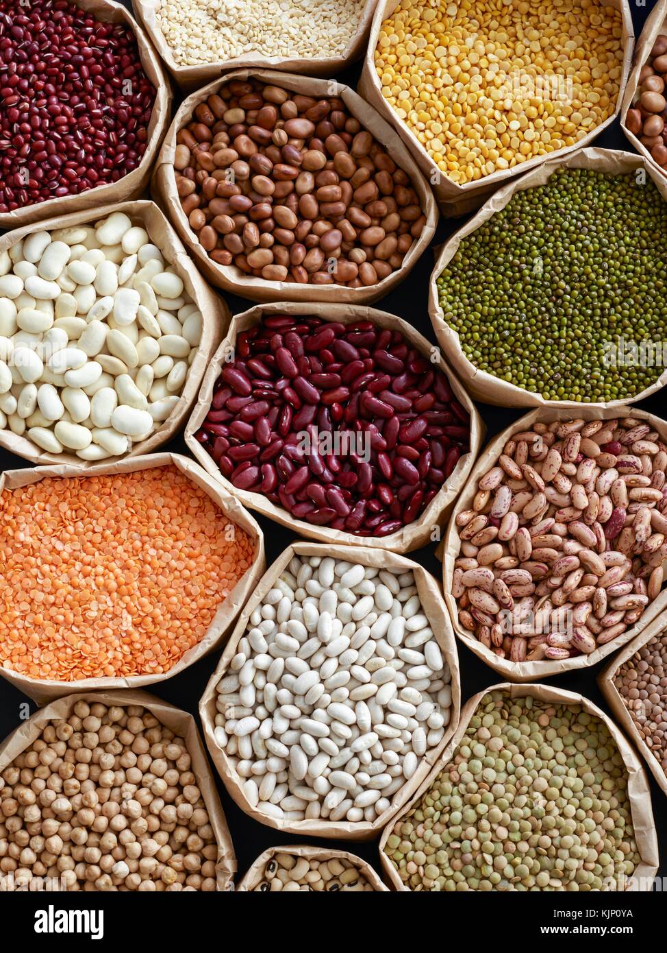 Pulses in paper bags, overhead view. Stock Photo