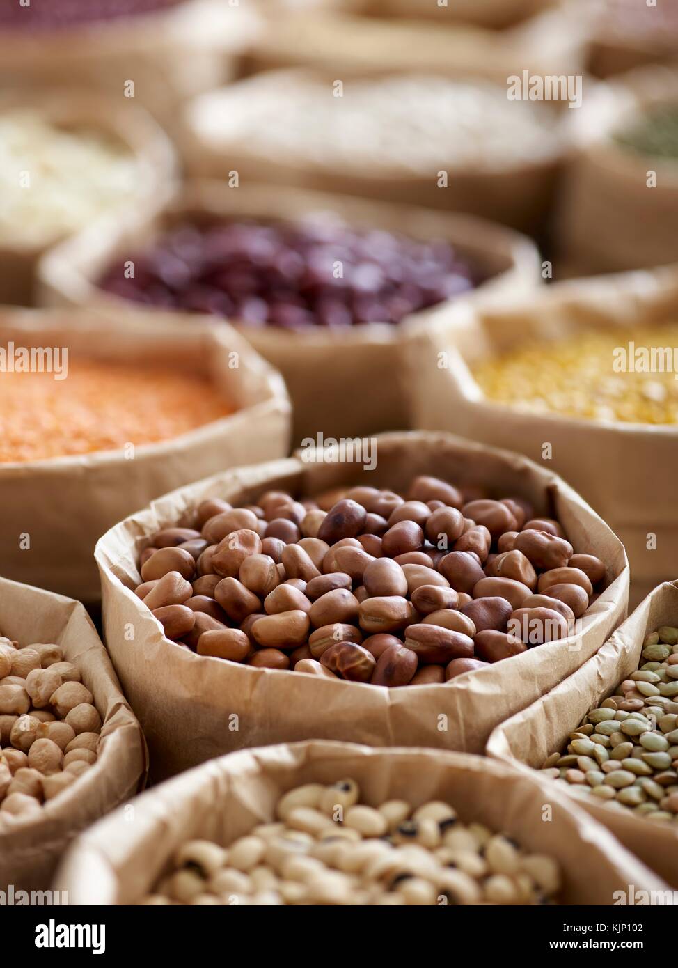 Pulses in paper bags. Stock Photo