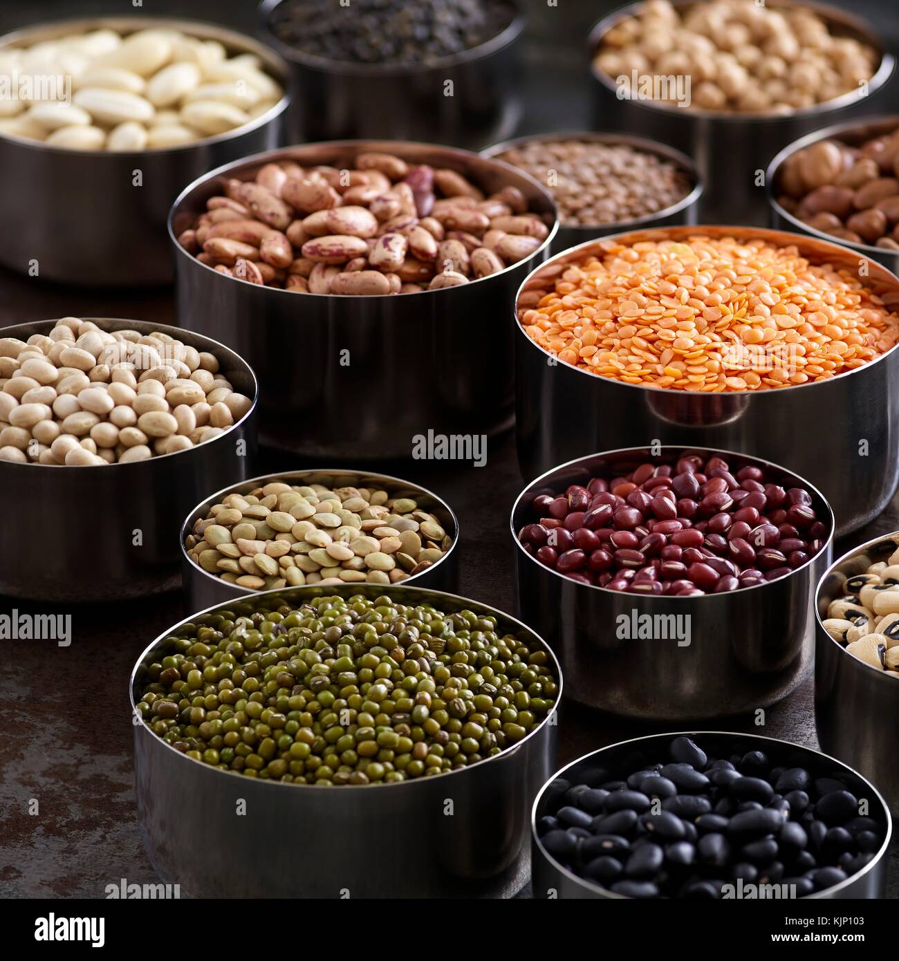 Pulses in metal bowls. Stock Photo