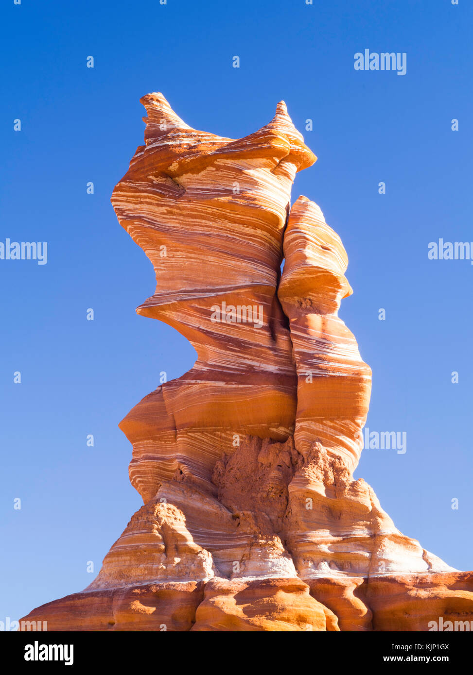 Morning view of the Hopi Clown, a Moenave Sandstone formation in the Adeii Echii Cliffs of Coconino County, Arizona. Stock Photo