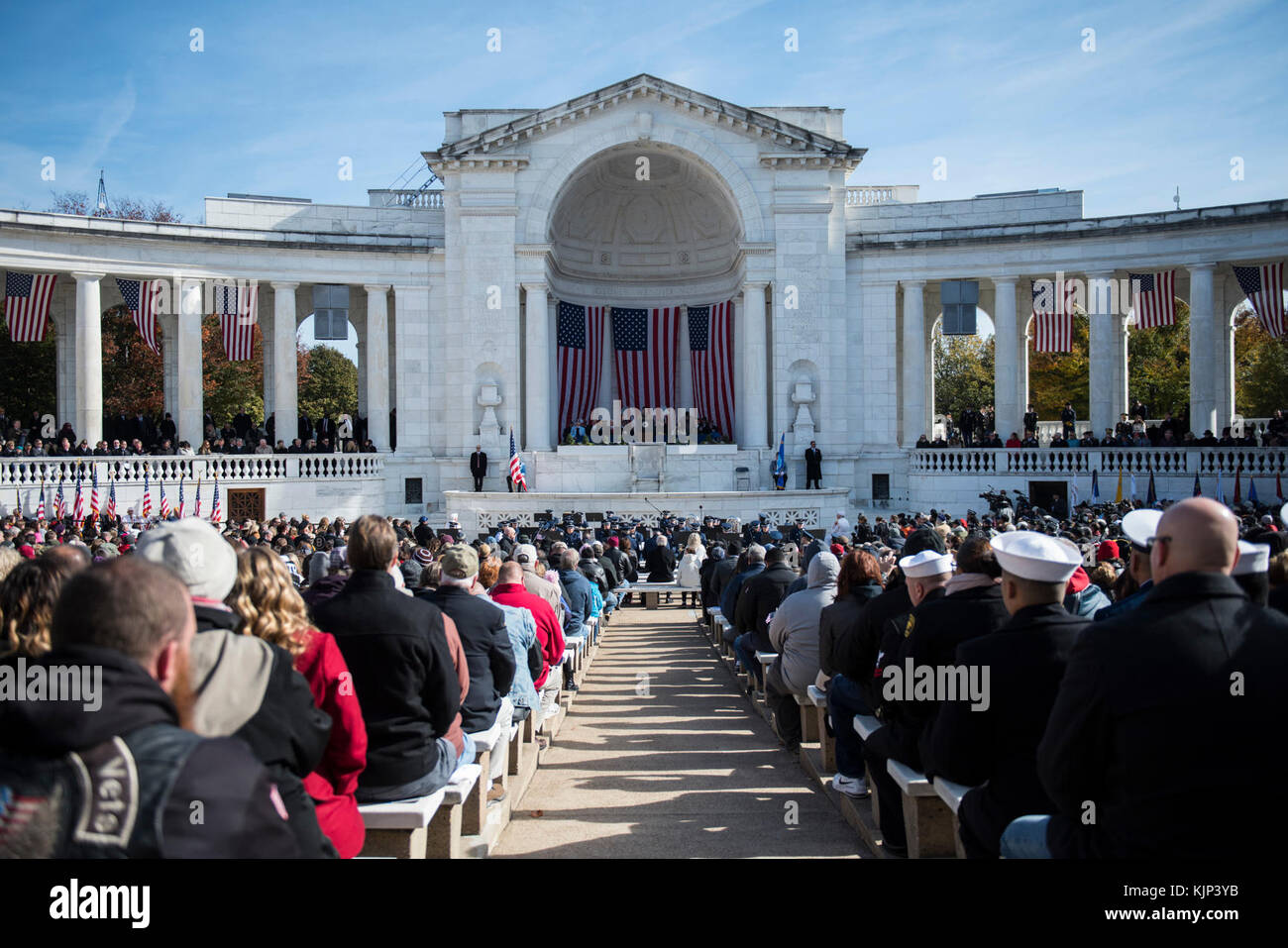 Attendees of the Veterans Day observance in the Memorial Amphitheater ...
