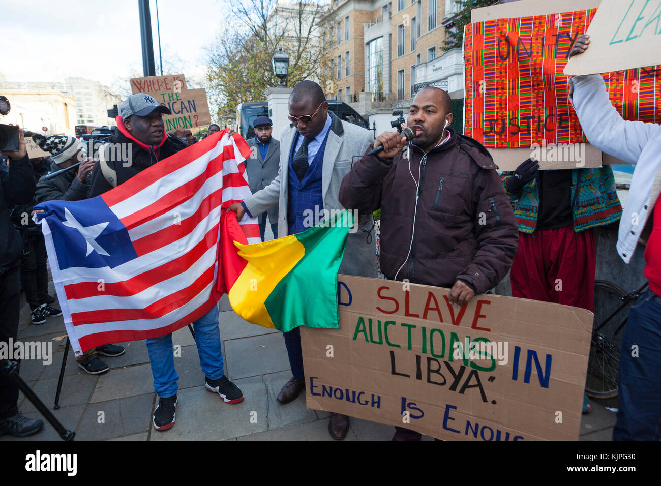 London, UK. 26th Nov, 2017. 26 November, 2017. No Borders, No Slavery Protest. Embassy of Libya, London UK. Following recent videos and reports released on migrant slave auctions in Libya, anti-slavery groups and SOAS Student Union and following along with French intellectuals like Tiken Jah Fakoly, hold a protest outside the Libyan Embassy in London. Organisers claim that despite this evidence the EU and UK continue to work with Libyan authorities to imprison migrants or leave them to drown in international waters. Credit: Steve Parkins/Alamy Live News Credit: Steve Parkins/Alamy Live News Stock Photo