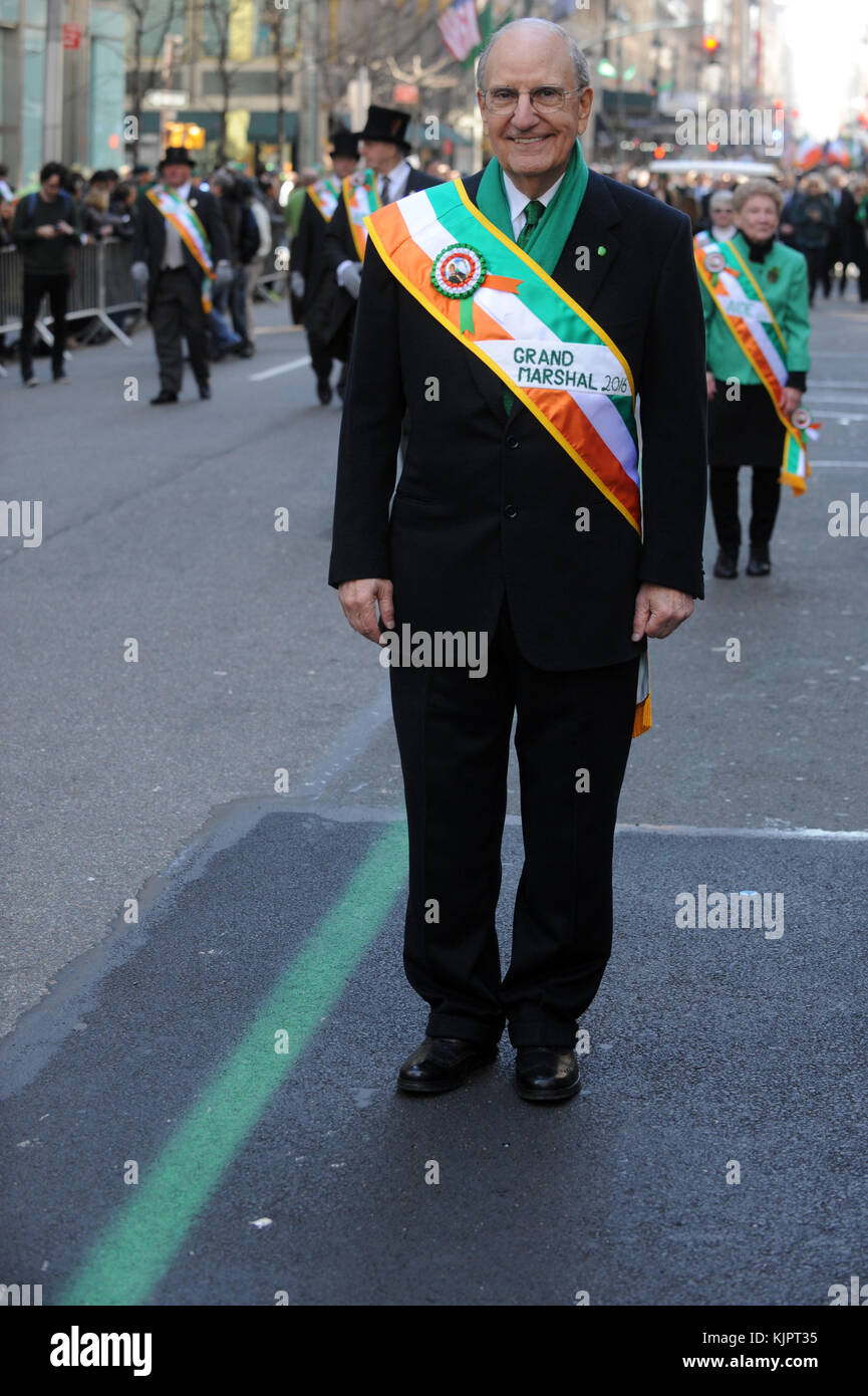 NEW YORK, NY - MARCH 17: Grand Marshal George Mitchell  marches in the annual St. Patrick's Day parade, one of the largest and oldest in the world on March 17, 2016 in New York City. Now that a ban on openly gay groups has been dropped, Mayor de Blasio is attending the parade for the first time since he became mayor in 2014. The parade goes up Fifth Avenue ending at East 79th Street and will draw an estimated 2 million spectators along its 35-block stretch   People:  Grand Marshal George Mitchell Stock Photo