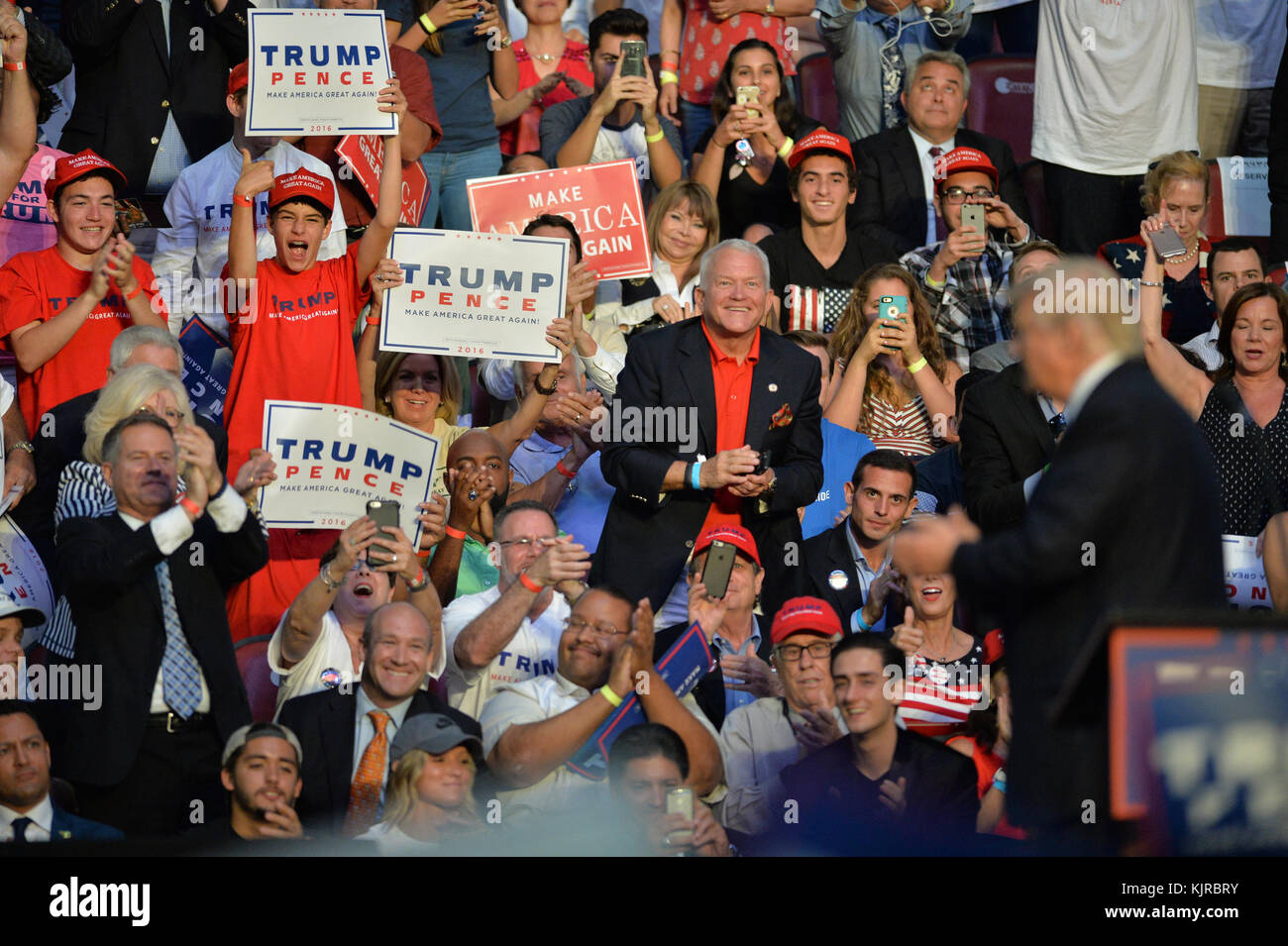 FORT LAUDERDALE, FL - AUGUST 10: Donald Trump on Wednesday again slammed Hillary Clinton and her campaign for allowing the father of Orlando shooter Omar Mateen to sit in the stands behind her at a recent rally But sitting behind Trump was ex-congressman Mark Foley, who resigned in disgrace in 2006 after sending sexually explicit messages to underage teenage boys.during his campaign event at the BB&T Center on August 10, 2016 in Fort Lauderdale, Florida.  People:  Mark Foley, Donald Trump Stock Photo