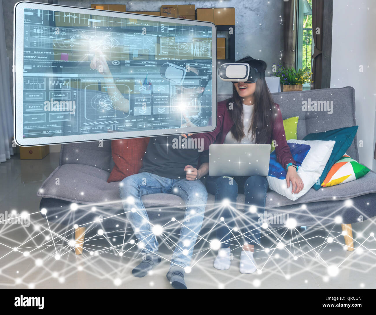 Asian young man and woman in casual clothes wear the virtual reality ...