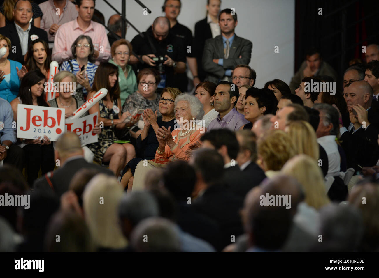 MIAMI, FL - JUNE 15: Former Florida Governor Jeb Bush on stage to announce his candidacy for the 2016 Republican presidential nomination at Miami Dade College - Kendall Campus Theodore Gibson Health Center (Gymnasium) June 15, 2015 in Miami, Florida. John Ellis 'Jeb' Bush will attempt to follow his brother and father into the nation's highest office when he officially announces today that he'll run for president of the United States   People:  Barbara Bush, George P. Bush Stock Photo