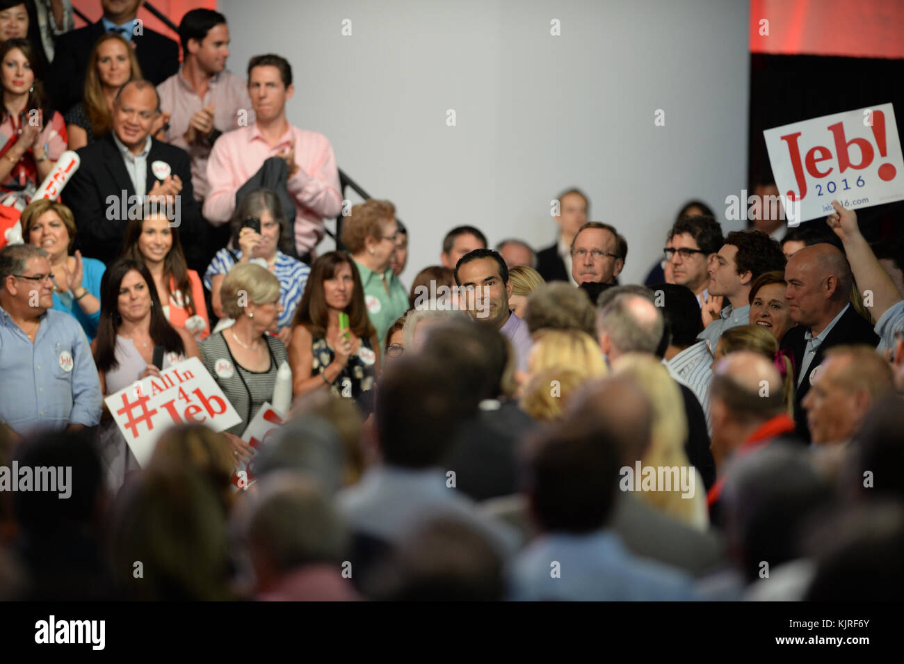 MIAMI, FL - JUNE 15: Former Florida Governor Jeb Bush on stage to announce his candidacy for the 2016 Republican presidential nomination at Miami Dade College - Kendall Campus Theodore Gibson Health Center (Gymnasium) June 15, 2015 in Miami, Florida. John Ellis 'Jeb' Bush will attempt to follow his brother and father into the nation's highest office when he officially announces today that he'll run for president of the United States   People:  George P. Bush Stock Photo