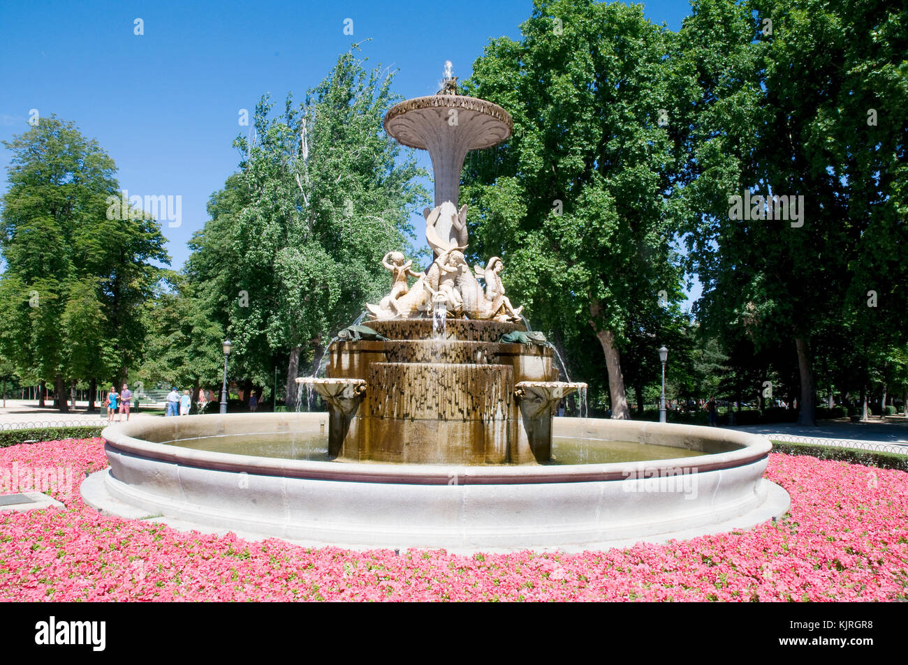 Fountain with pink flowers. The Retiro park, Madrid, Spain. Stock Photo