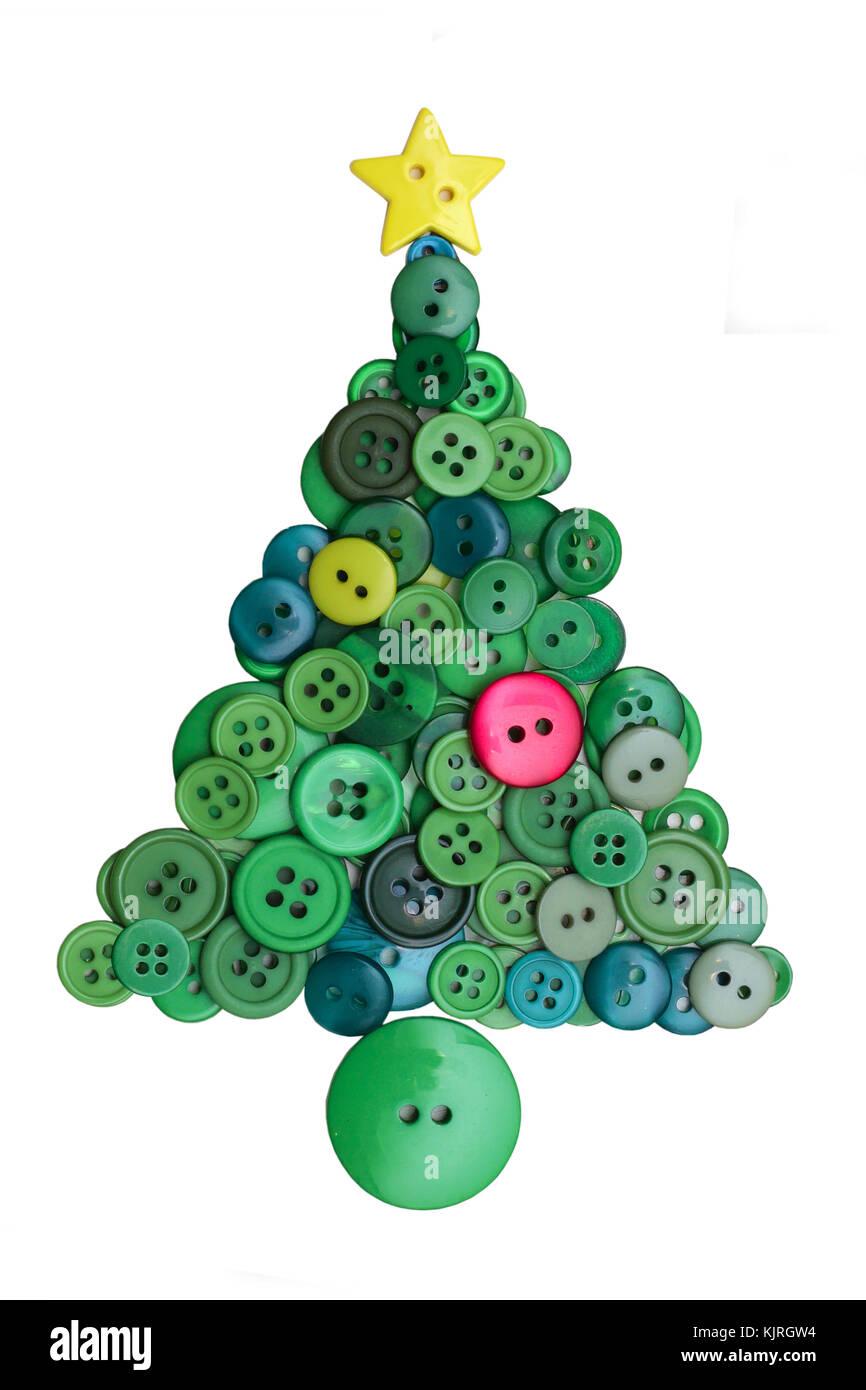 Christmas tree shape made from buttons on a white background Stock Photo -  Alamy