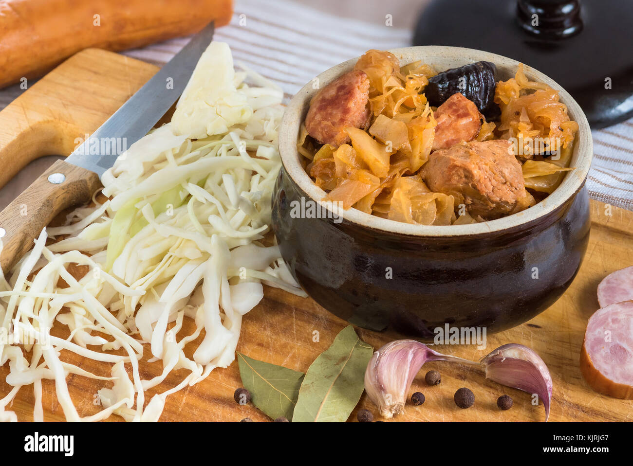 Bigos-traditional Polish dish of finely chopped meat, mushrooms, and sausage with sauerkraut and shredded fresh cabbage. The dish is also traditional  Stock Photo
