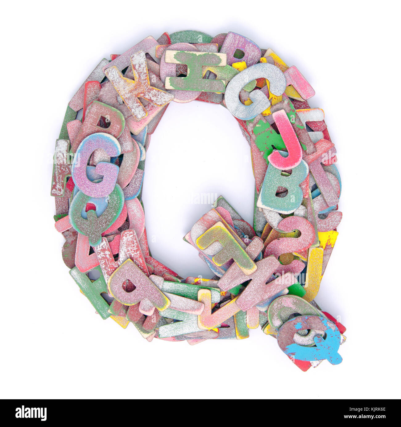 lots of small wooden letters to make up the letter Q Stock Photo