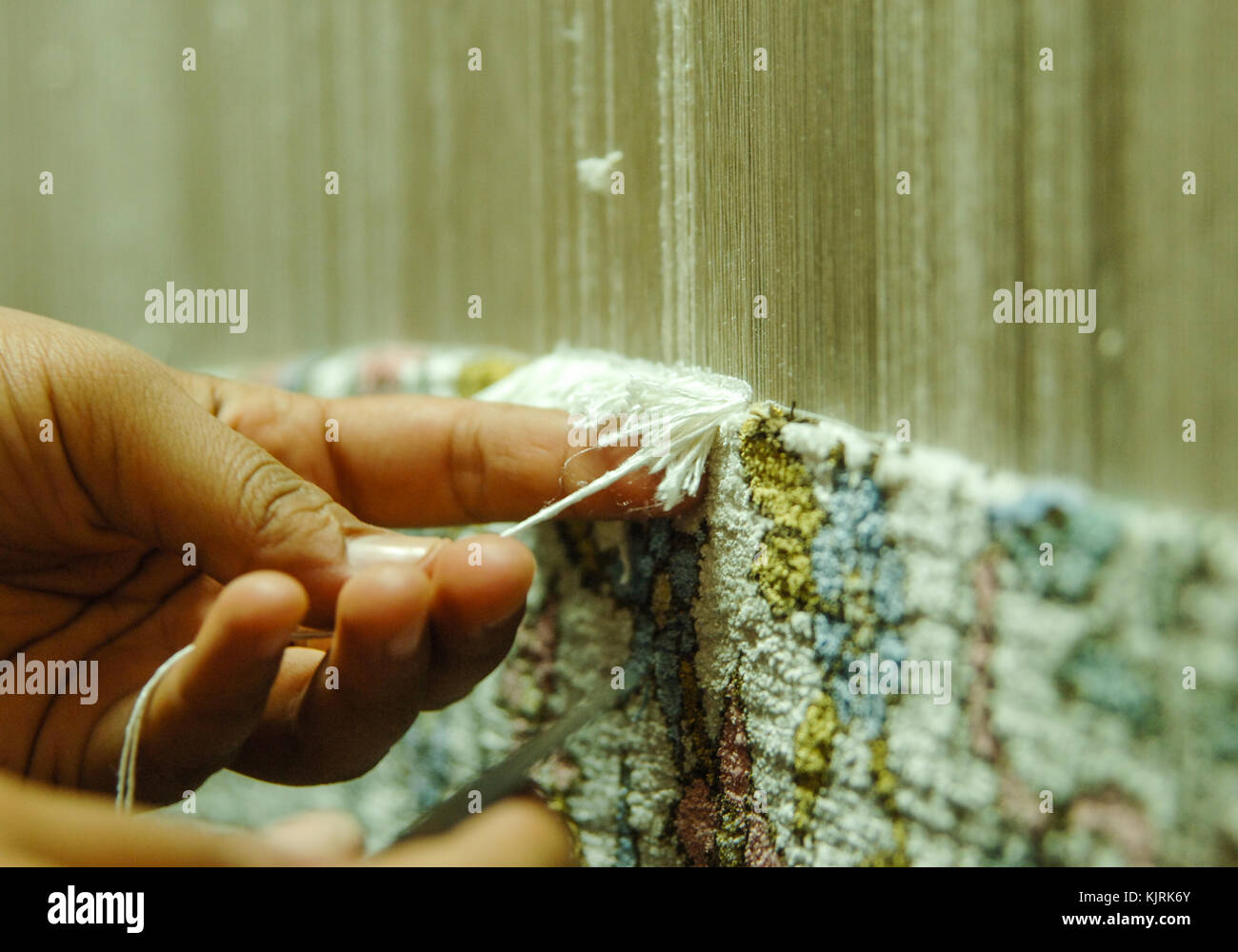 weaving and manufacturing of handmade carpets closeup Stock Photo Alamy
