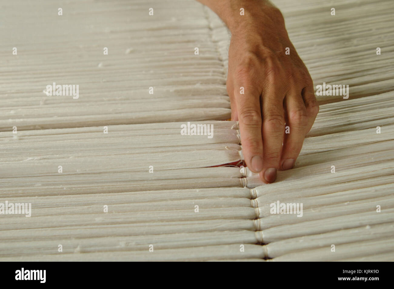 weaving and manufacturing of handmade carpets closeup Stock Photo Alamy