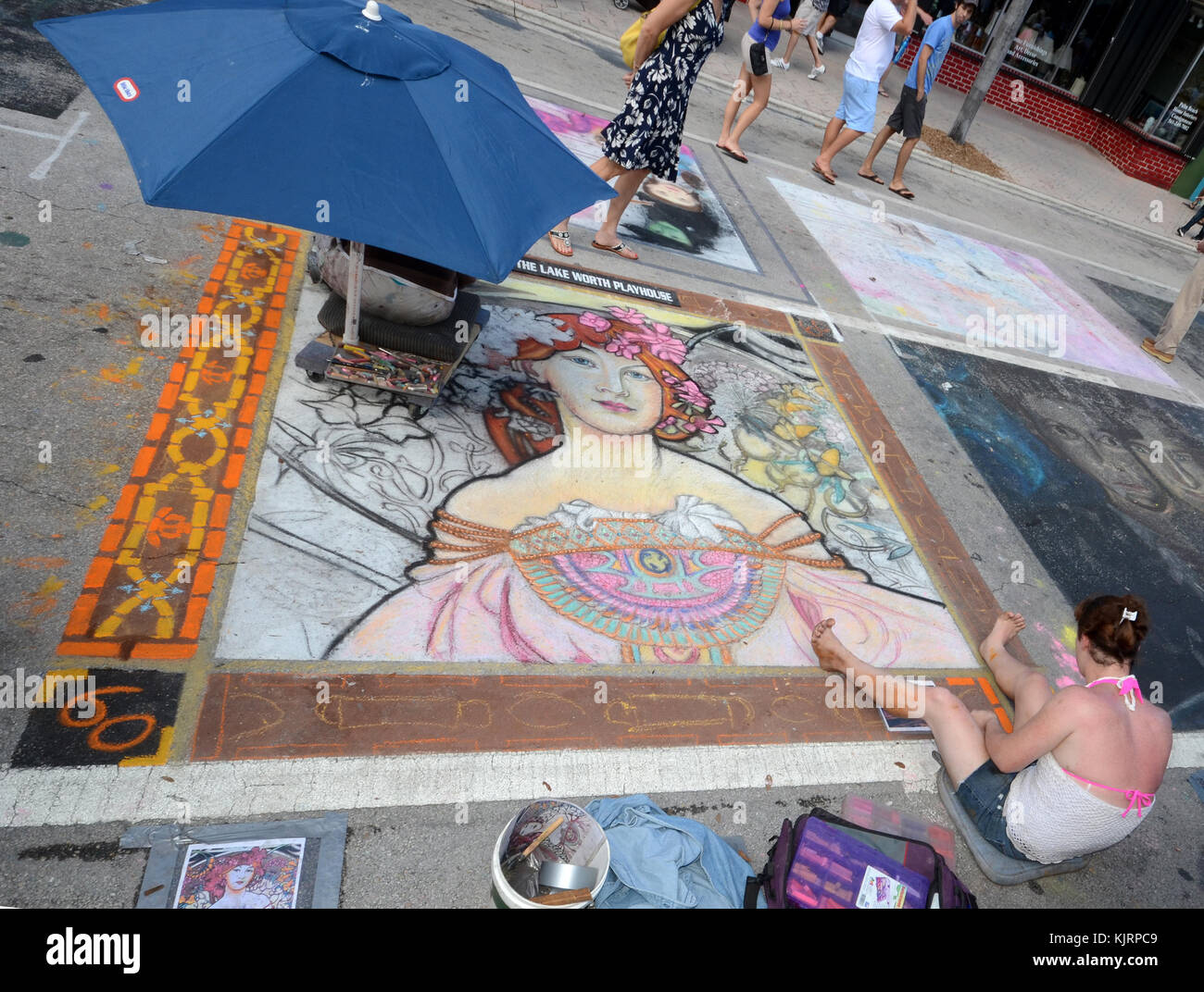 Lake Worth, USA February 24, 2013 Artists crate chalk drawing during