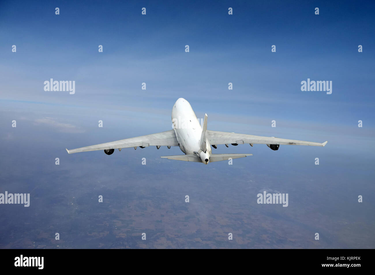 Jumbo jet in flight air to air Stock Photo