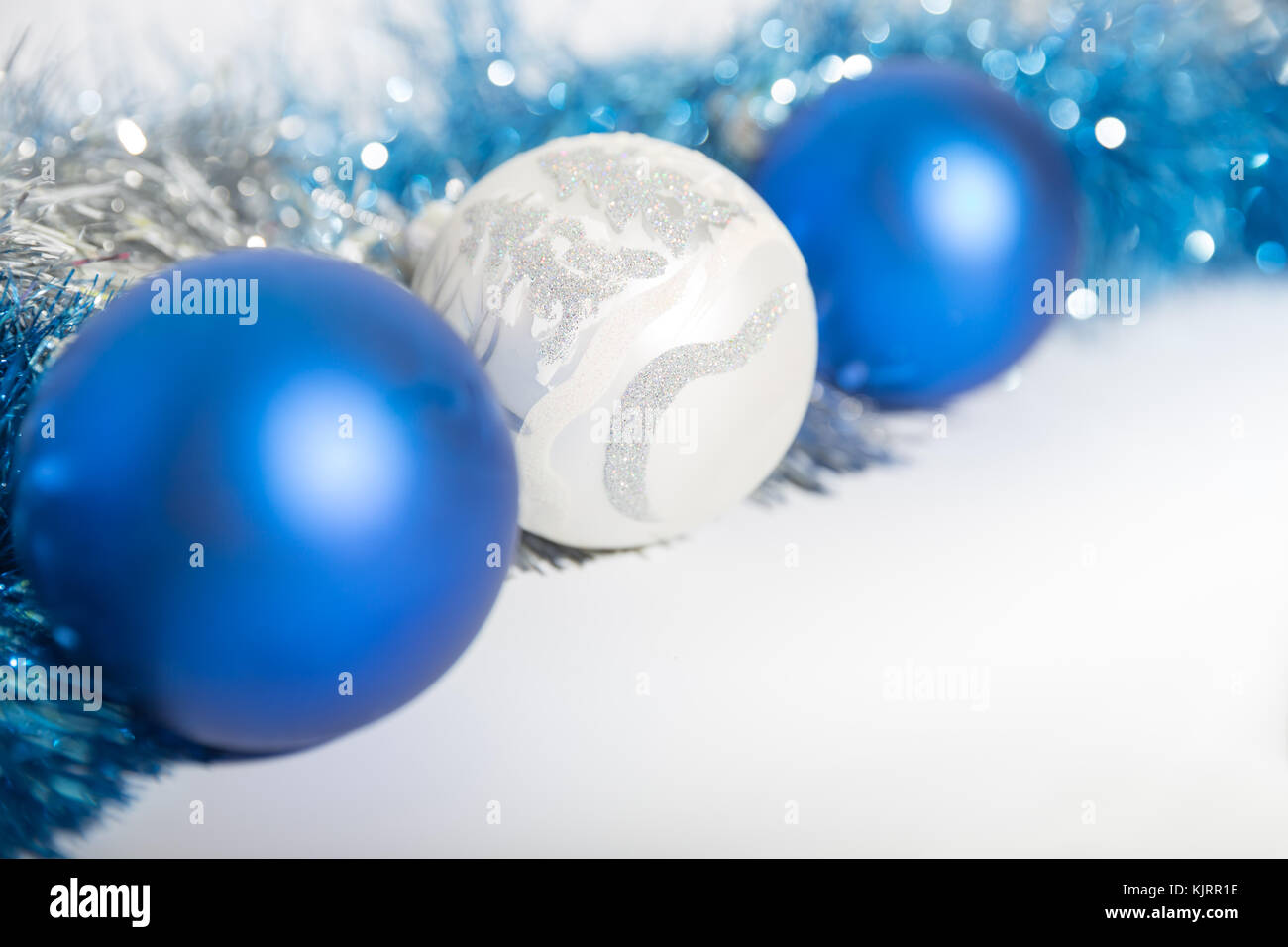 christmas decorations of blue and silver on a white background three balls and a tinsel - Blue And Silver Christmas christmas decorations of blue and silver on a white background three balls and a tinsel - Blue And Silver Christmas