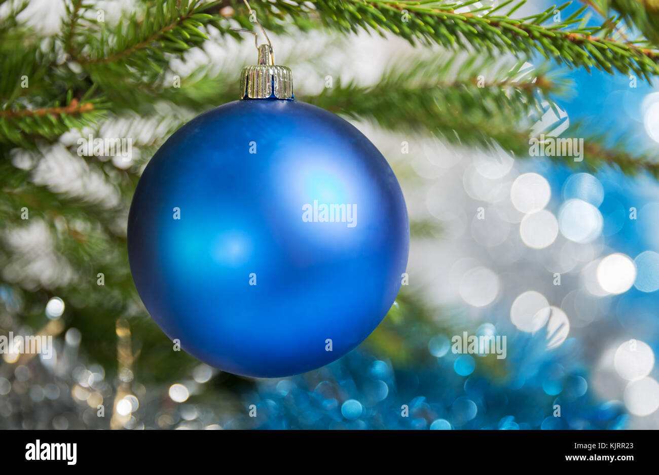 Christmas decorations, one blue ball hanging on the Christmas tree ...