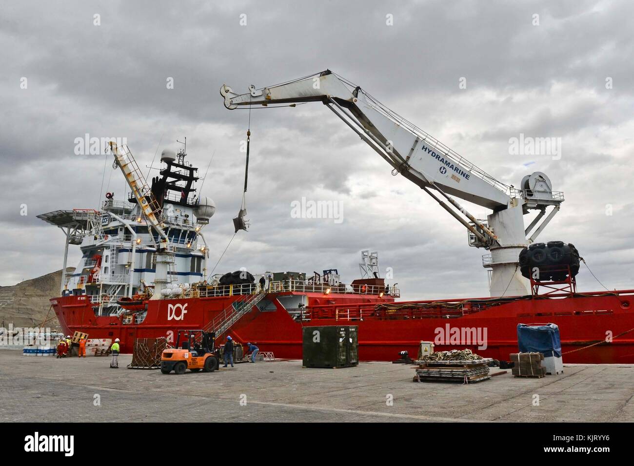 U.S. and Argentinean Navy sailors load rescue equipment on to the Norwegian offshore construction supply and support vessel Skandi Patagonia during search and rescue efforts for the Argentine TR-1700-class diesel-electric submarine ARA San Juan November 20, 2017 in Comodoro Rivadavia, Argentina.  (photo by Derek Harkins via Planetpix) Stock Photo