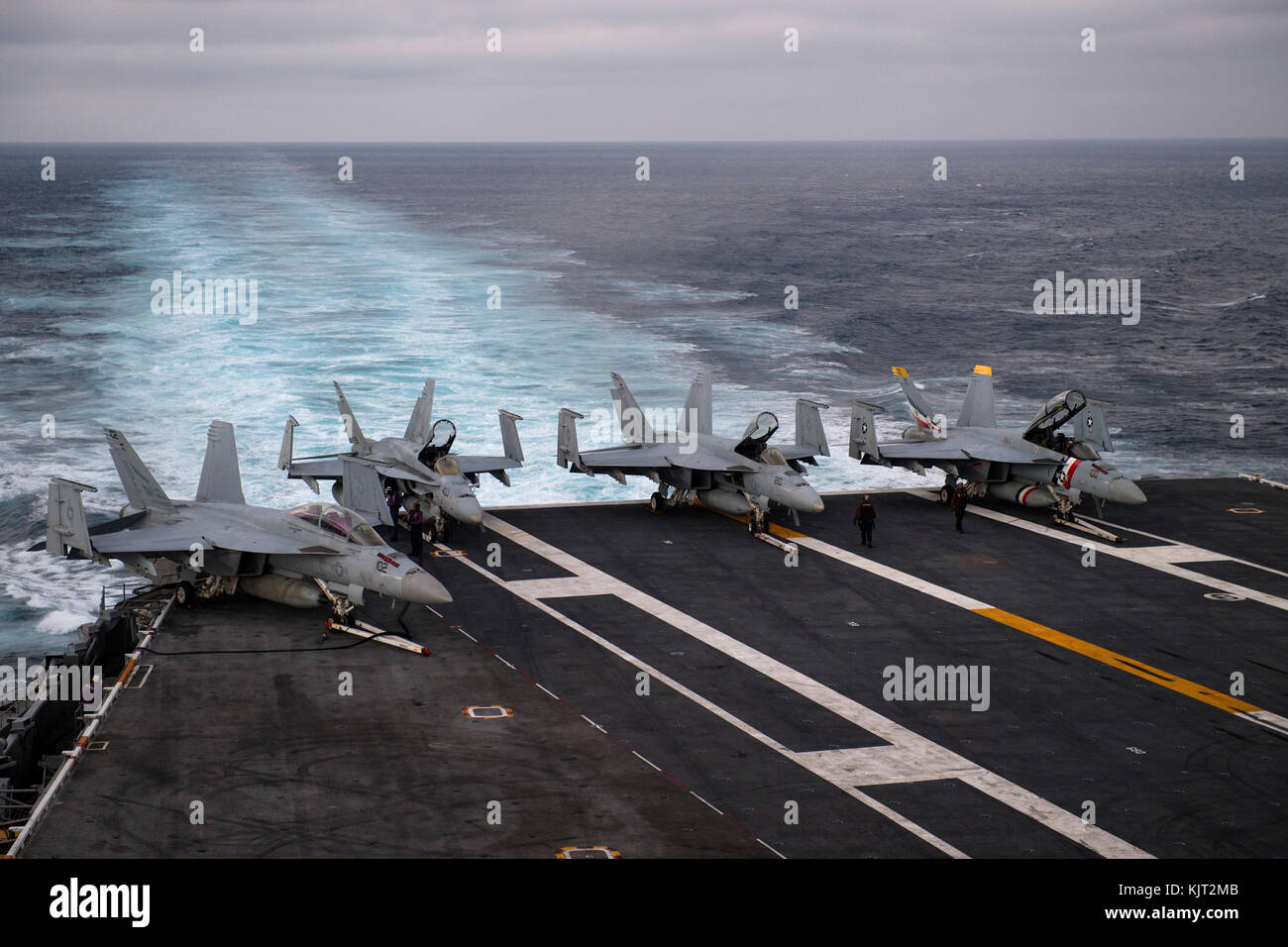 Aircraft sit on the flight deck of the U.S. Navy Nimitz-class aircraft carrier USS Carl Vinson as it steams underway October 27, 2017 in the Pacific Ocean. (photo by Jasen Morenogarcia via Planetpix) Stock Photo