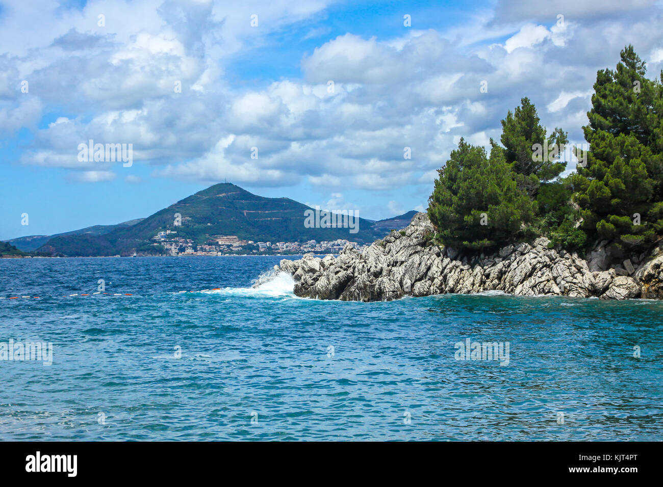 Picturesque summer view of Adriatic seacoast in Budva Riviera. Famous Queen's Beach (Kraljicina Plaza), Sveti Stefan, Montenegro Stock Photo