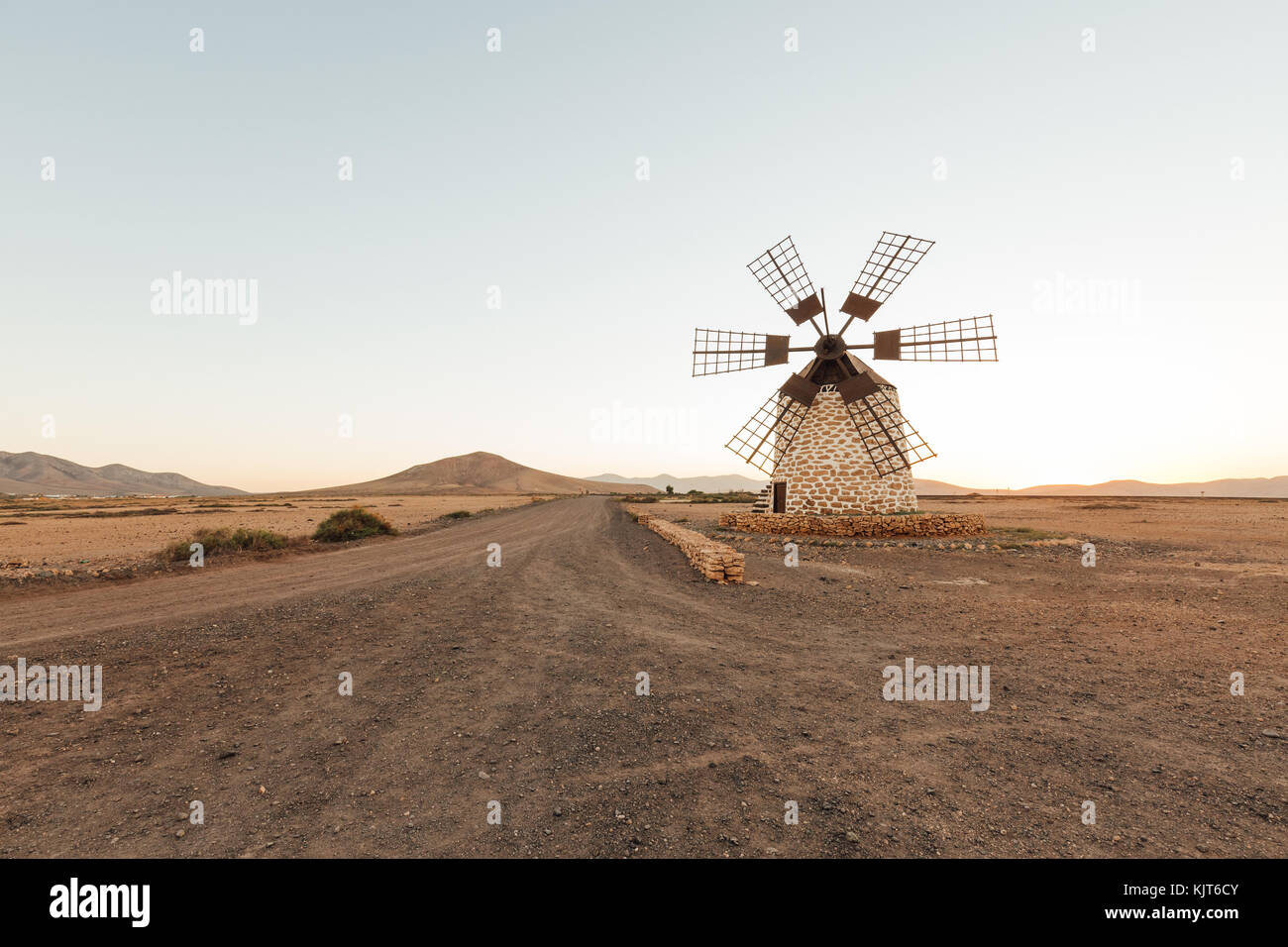 A small windmill in the desert of Fuerteventura, Spain Stock Photo
