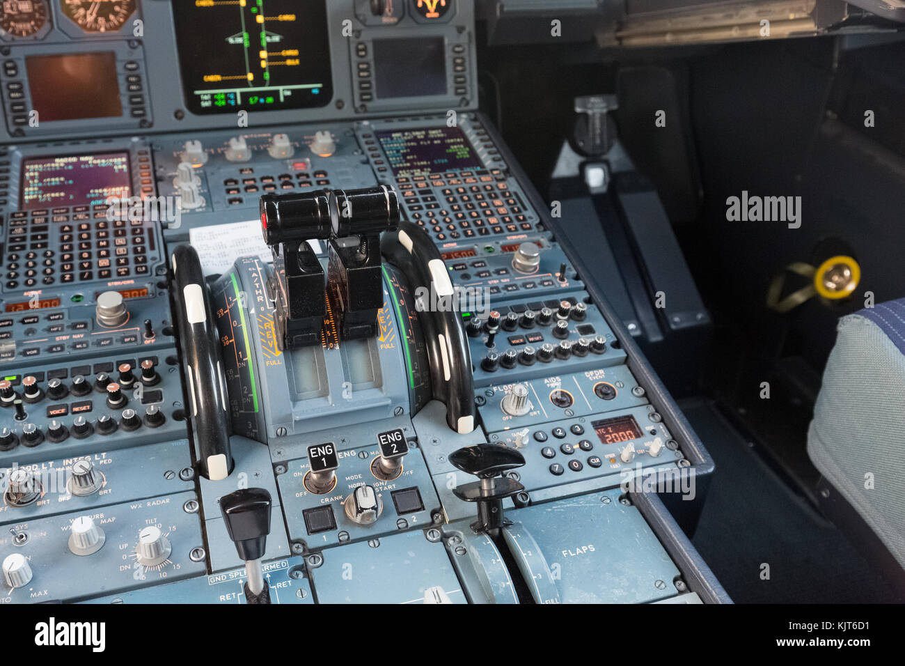 The black throttle lever in an Airbus commercial plane Stock Photo